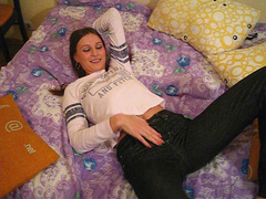 Dude films hot brunette girlfriend undressing on the bed